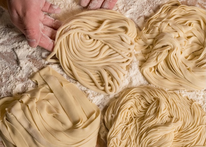 Various types of hand-made noodles traditional preparation